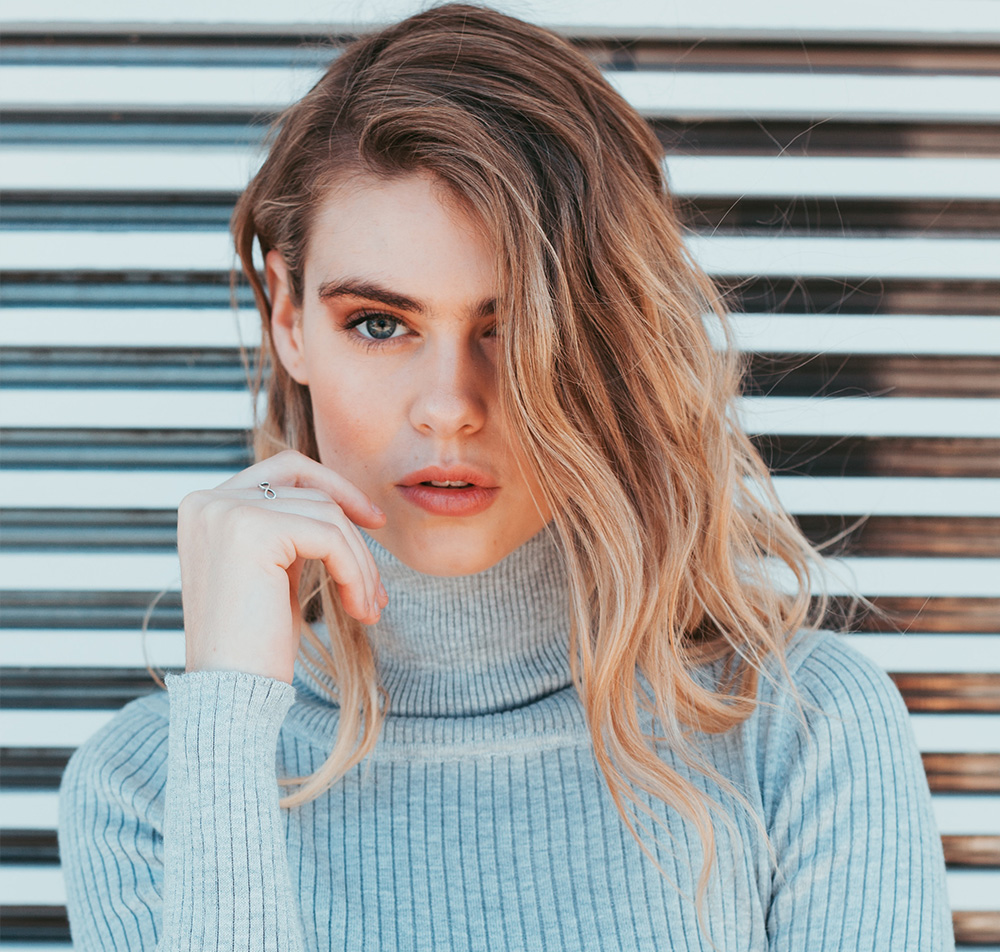 Woman in a cashmere turtleneck jumper