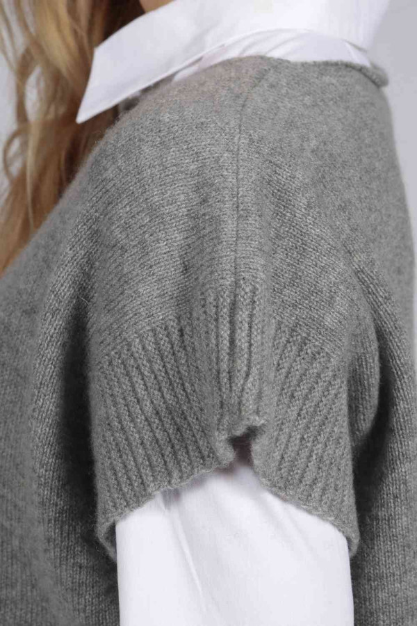 Light grey women's pure cashmere sleeveless sweater close-up